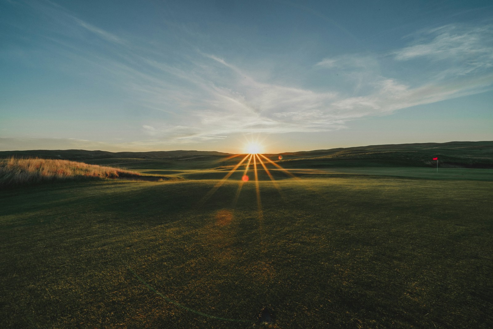 Golf course with sunset